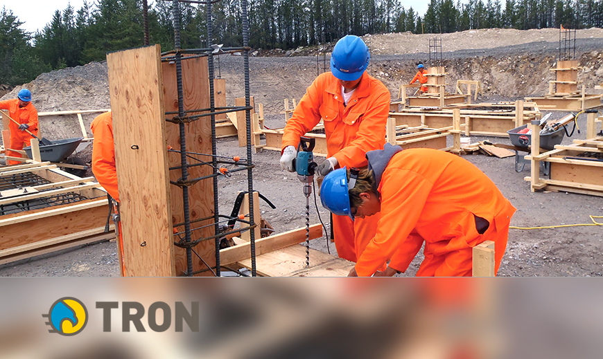 Two workmen in construction site