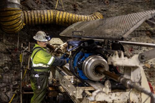 A Team Drilling worker operates a piece of equipment